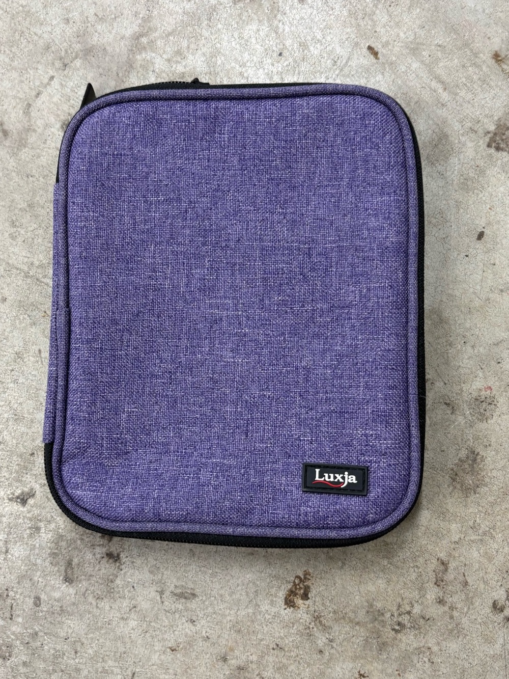 The Luxja Purple Zippered Travel Organizer Case is a convenient and stylish acce